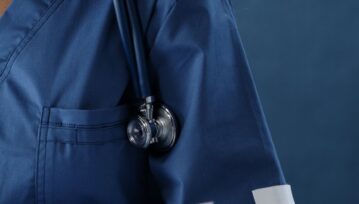 A Stethoscope on a Medical Professional's Shoulder