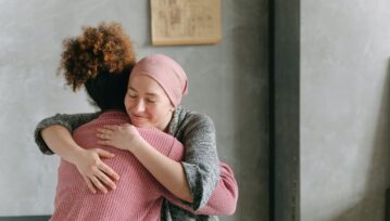 Women Hugging Each Other